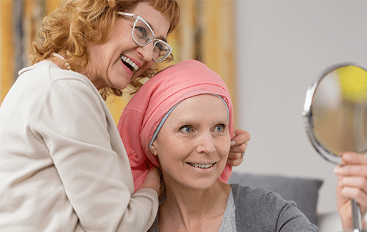 Two Woman Smiling